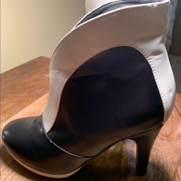 Woman’s black and white high heel booties. Approx 4 1/2 inches high. Pre-owned. - Picture 2 of 8